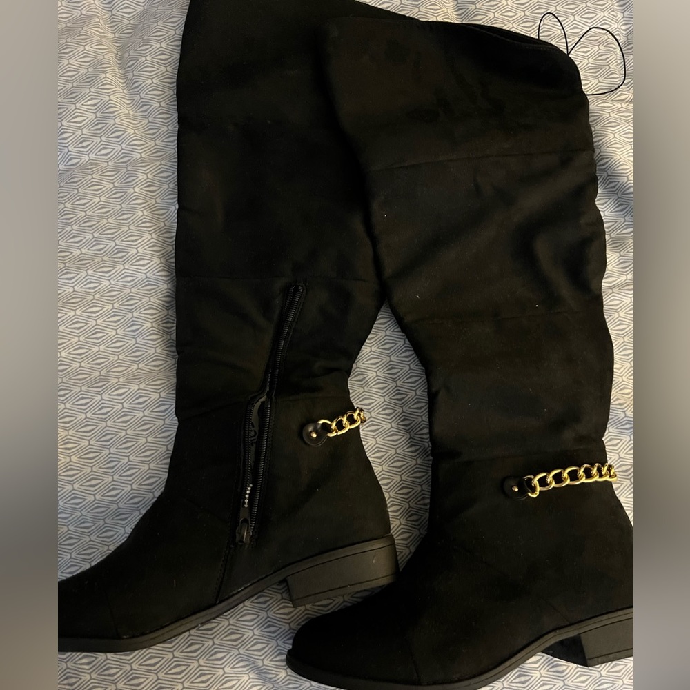 Brand new black knee high boots